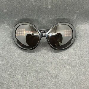 Pre loved Chanel round tortoise sunglasses with pearls on the side.